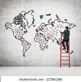 Future Business Developments Strategy. Businessman Drawing The World Map And The Main Points To Expand The Business. 