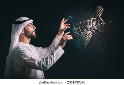 Future digital technology metaverse game and entertainment, Arabic man having discovering the univers using virtual reality hologram. the concept of technologies of the future. - Shutterstock ID 2061639290