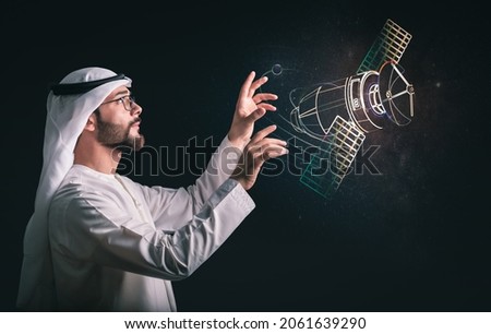 Future digital technology metaverse game and entertainment, Arabic man having discovering the univers using virtual reality hologram. the concept of technologies of the future.