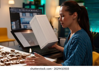 Future Engineering Architect Analyzing Maquette Model For Business Building Plan Project Design At Workplace. Digital Designer Doing Blueprint Sketch Concept On Monitor Screen Computer