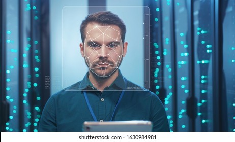 Future. Face Detection. Biometric Facial Recognition. ID Information Security. 3D Scanning Of Face Of Caucasian Server Engineer Working With Tablet At Data Center. Data Analyzing Animation With Points