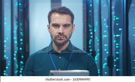 Future. Face Detection. Biometric Facial Recognition. ID Information Security. 3D Scanning Of Face Of Caucasian Server Engineer Working With Tablet At Data Center. Data Analyzing Animation With Points