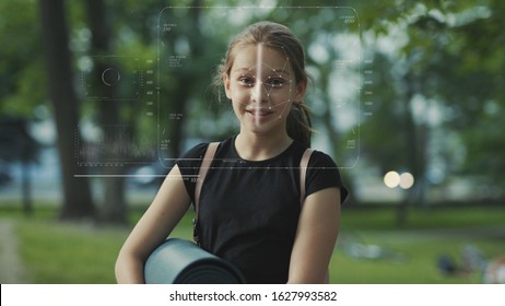 Future. Face Detection. Technological 3d Scanning. Biometric Facial Recognition. Face Id. Technological Scanning Of The Face Of Beautiful Caucasian Child In The Park For Facial Recognition. Shoted By