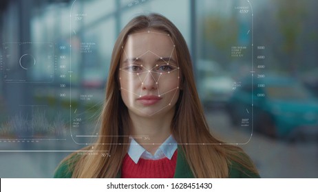 Future. Face Detection. Technological 3d Scanning. Biometric Facial Recognition. Face Id. Technological Scanning Of The Face Of Beautiful Caucasian Woman In The City For Facial Recognition. Shoted By