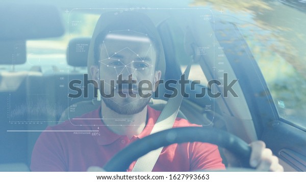 Future. Face Detection. Technological 3d Scanning.\
Biometric Facial Recognition. Face Id. Technological Scanning of\
the Face of Handsome Caucasian Man In The Car for Facial\
Recognition. Shoted by\
Arri