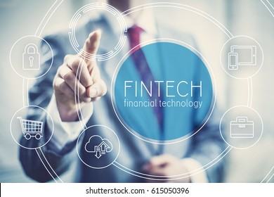 Future of financial technology concept businessman selecting fintech word - Shutterstock ID 615050396