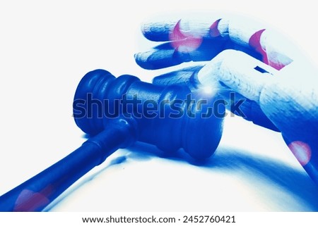 Future innovative concept of efficient and fair justice system with closeup robotic hand holding gavel as artificial intelligence in transparent judicial proceedings by an AI judge. Equilibrium