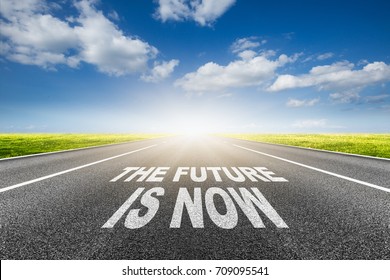 The Future Is Now Written On Asphalt Road.Concept For Success And Passing Time.