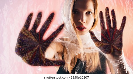 Future prediction. Nft art. Palmistry fortune. Confident oracle woman face colorful glitch noise hand palms on peach pink glow background. - Shutterstock ID 2350610207