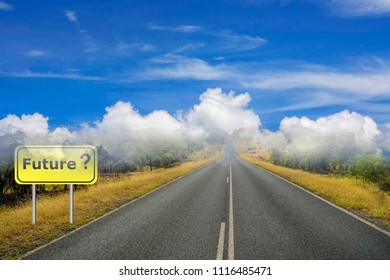 A Future Sign And Road Going Into The Horizon With Clouds Depicting Uncertain Future