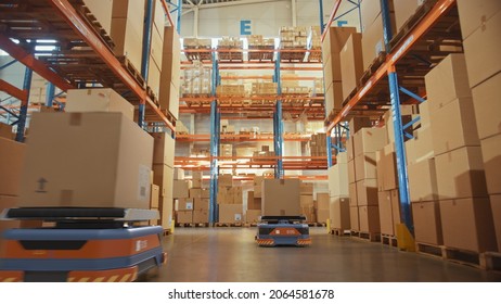 Future Technology 3D Concept: Automated Modern Retail Warehouse AGV Robots Transporting Cardboard Boxes In Distribution Logistics Center. Automated Guided Vehicles Delivering Goods, Products, Packages