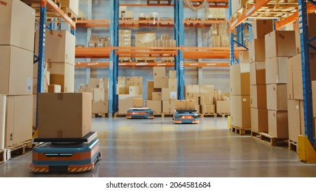 Future Technology 3D Concept: Automated Modern Retail Warehouse AGV Robots Transporting Cardboard Boxes In Distribution Logistics Center. Automated Guided Vehicles Delivering Goods, Products, Packages