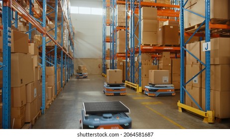 Future Technology 3D Concept: Automated Modern Retail Warehouse AGV Robots Transporting Cardboard Boxes In Distribution Logistics Center. Automated Guided Vehicles Delivering Goods, Products, Packages