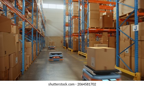 Future Technology 3D Concept: Automated Modern Retail Warehouse AGV Robots Transporting Cardboard Boxes In Distribution Logistics Center. Automated Guided Vehicles Delivering Goods, Products, Packages