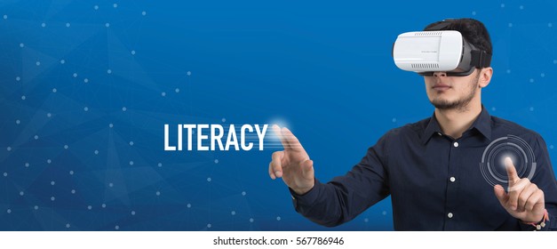 Future Technology and Business Concept: The Man with Glasses of Virtual Reality and touching LITERACY button - Powered by Shutterstock