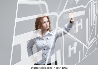 Future technology, navigation, location concept. Woman showing transparent screen with gps navigator map.