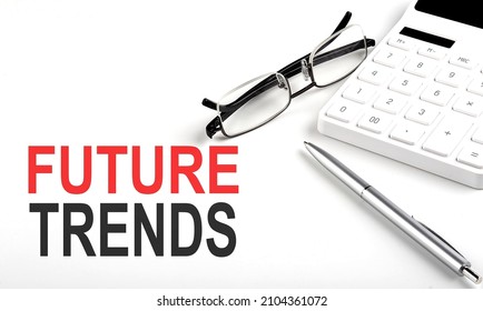 FUTURE TRENDS Concept. Calculator,pen And Glasses On White Background