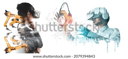 Future VR technology for mechanized industry robot arm control . Concept of robotics technology for industrial revolution and automated manufacturing process .