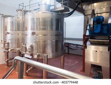 Future wine processing in stainless cisterns of plant 