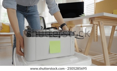 Future of workforce remote work fully permanent. Asia people happy relax move job to new small workspace set up desk picking file folder from box. Keep it chores neat start long term plan career work.