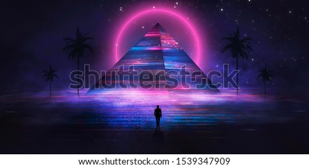 Futuristic abstract night neon background. Light pyramid in the center. Night view of the pyramid illumination. Neon lights reflected on wet asphalt.
