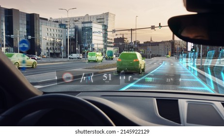 Futuristic Autonomous Self-Driving Car Moving Through City, Head-up Display HUD Showing Infographics: Speed, Distance, Navigation. Road Scanning. Driver Seat Point Of View POV  First Person View 