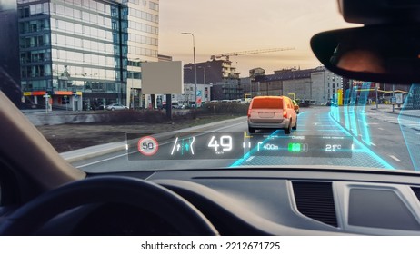 Futuristic Autonomous Self-Driving Car Moving In The City, Head-up Display Showing Infographics: Speed, Distance, Navigation. Road Scanning Concept. View From Driver Seat. First Person View FPV.