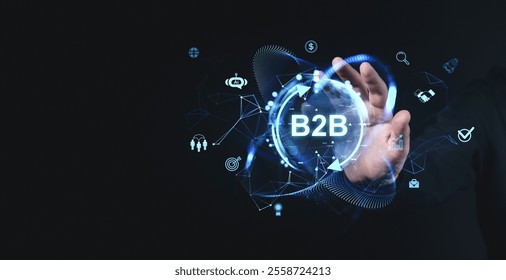 Futuristic B2B technology illustration with icons and hand interacting with holographic interface on dark background, symbolizing innovation - Powered by Shutterstock