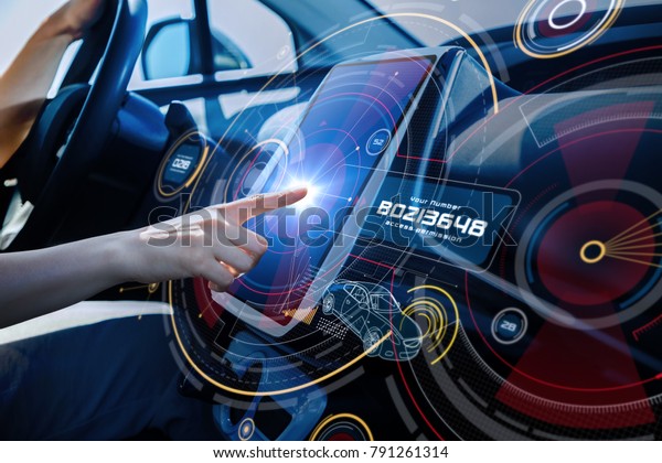 Futuristic car cockpit and touch screen.
Autonomous car. Driverless vehicle. HUD(Head up display).
GUI(Graphical User Interface). IoT(Internet of
Things).