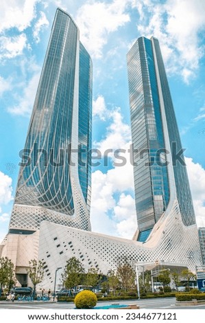 Futuristic cityscape with Towering Skyscrapers and Landmarks. Modern architecture, and clear blue skies.