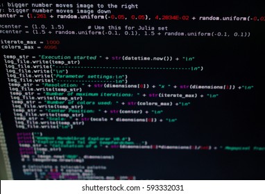 Futuristic colorful piece of program code on black background, slightly tilted for cyber security