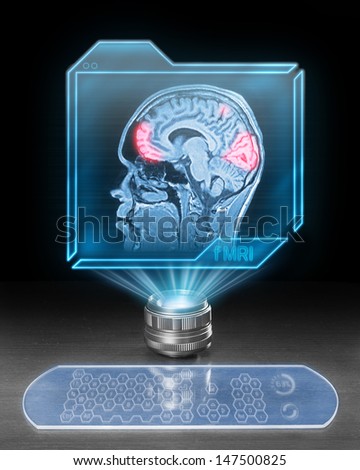 Futuristic computer with scan from functional magnetic resonance as part of research in cognitive neuroscience.