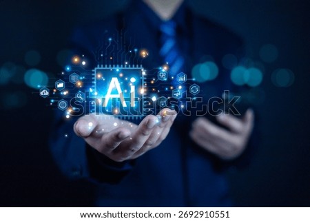 Futuristic concept of artificial intelligence and digital technology in business. Businessman holding glowing AI icon with data analytics, innovation, and machine learning network background.
