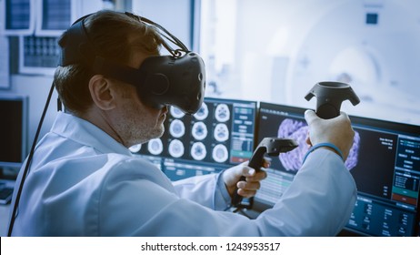 Futuristic Concept: In Medical Laboratory Surgeon Wearing Virtual Reality Headset Uses Controllers to Remotely Operate Patient with Medical Robot. High-Tech Advancements in Medicine. - Powered by Shutterstock - Get 15% off with code: PIKWIZARD15