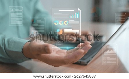 A futuristic data interface with graphs and charts floating above an open palm representing big data, business analytics, and digital management.