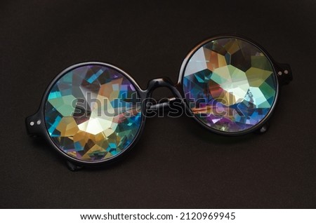 futuristic designer glasses with colored kaleidoscope lenses