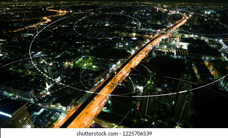 Futuristic Digital Broadcasting, Gps Location Signals And Data Connectivity In The Cityscape At Night Time