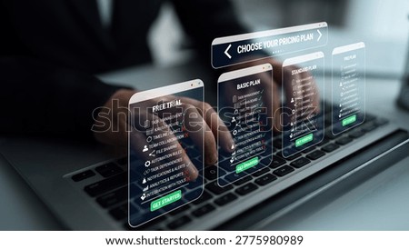 Futuristic Digital Interface Displaying Subscription Pricing Plans with Hands Typing on a Laptop in a Modern Office Setting Quark.