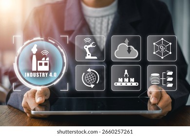 Futuristic digital interface showcasing Industry 4.0 technology with icons representing automation, cloud computing, and data management.