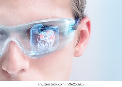 Futuristic doctor analyzing brain activity
