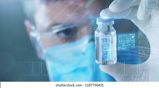 A futuristic doctor with syringe picks up the DNA from a test tube and appears a hologram of a patient's DNA. Concept: Futuristic medicine, medical care, future, dna, kinship, family