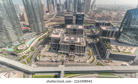 Futuristic Dubai Downtown and finansial district skyline aerial timelapse. Many office towers and skyscrapers with traffic on streets look down view - Shutterstock ID 2161908943