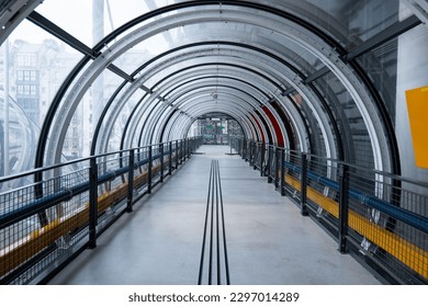 Futuristic glass tunnel. Modern Architecture tunnel. Pompidou Museum