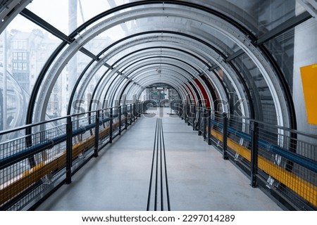 Futuristic glass tunnel. Modern Architecture tunnel. Pompidou Museum