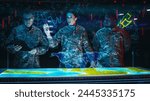 Futuristic High Tech Warfare: Military Intelligence Specialists use Augmented Reality Table Map to Scan Enemy Base. Army Recoinessance Using Advanced Sattelite Surveillance Technology For War