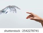 A futuristic image of a robotic hand reaching out to a human hand, symbolizes future technology. This blend of technology and humanity of the connection between human and robotic interactions. 