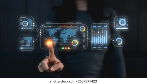 A futuristic interface displays data visualizations, charts, and global maps, with a hand interacting by touching the screen, suggesting advanced technology use.