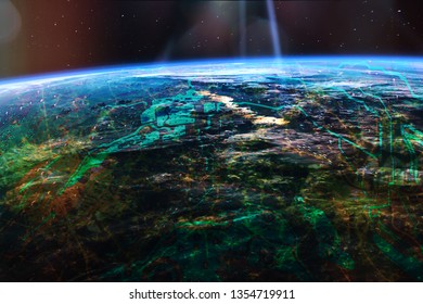 Futuristic internet of things (IoT) links the physical and digital worlds. City lights from outer space. Roads and map relief from motherboard. Elements of this image furnished by NASA.