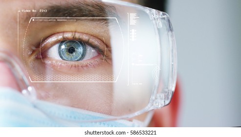 In a futuristic laboratory, a scientist with a pipette analyzes a colored liquid to extract the DNA and molecules in the test tubes.Concept:research,biochemistry,immersive technology,augmented reality - Powered by Shutterstock