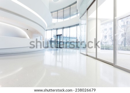 futuristic modern office building interior in urban city 